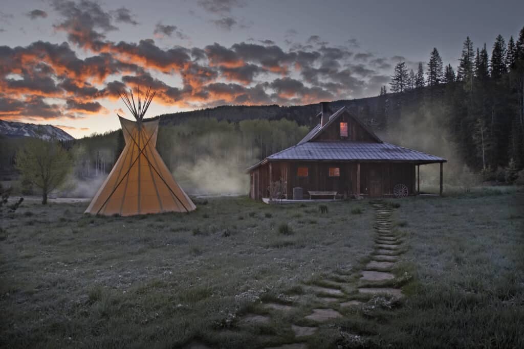 Bathhouse at Dunton Hot Springs, a resort in Colorado, at dawn.