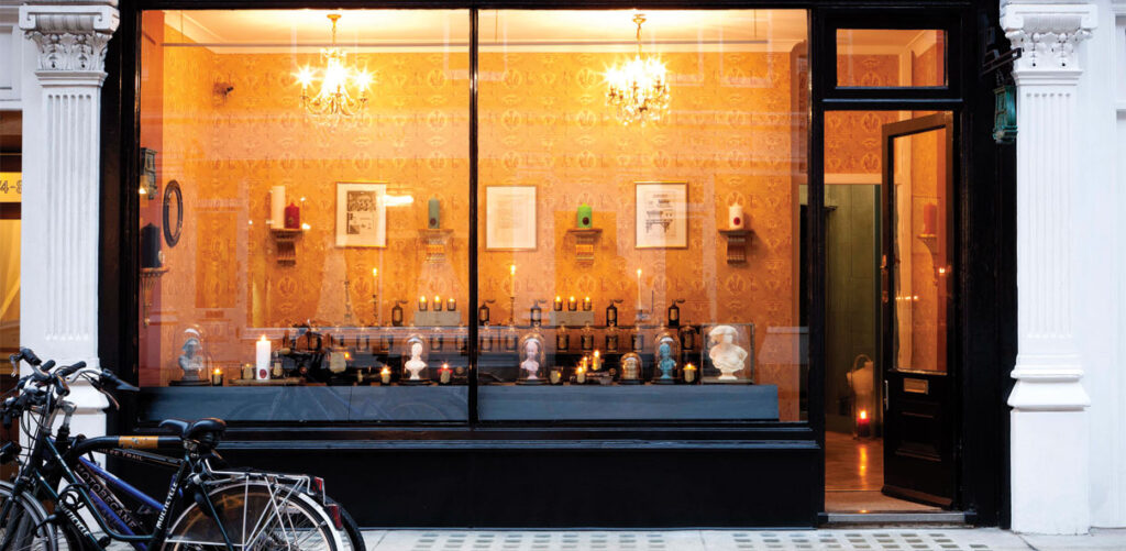Storefront of Cire Trudon, a sustainable candlemaker.