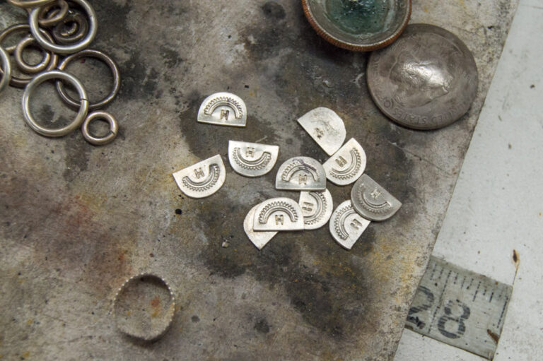 Pieces of metal used in the creation of Dennis Hogan's jewelry, heritage southwest design