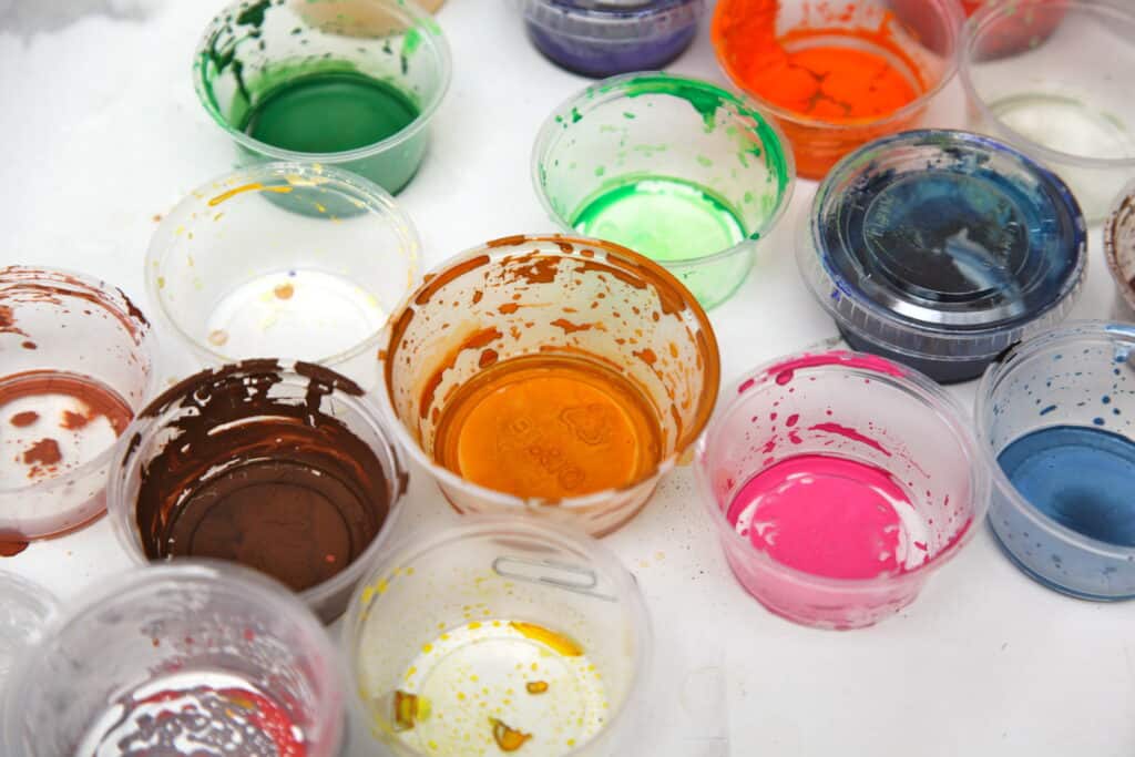 Various paint colors in bowls for Wrapped Studios.