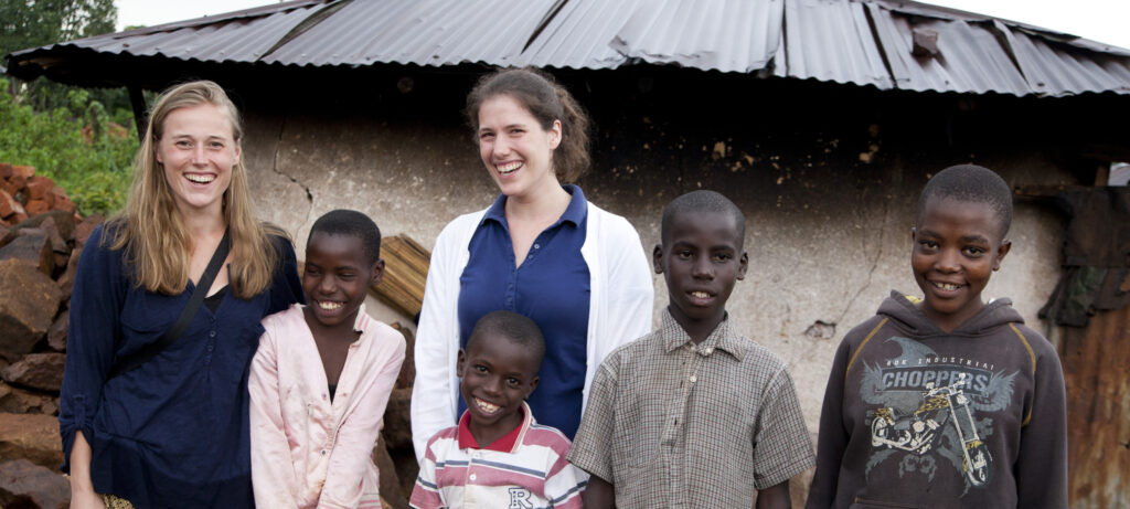 Portrait of Ajiri Tea founders, Kate and Sarah Holby, with children, employing women through their company.