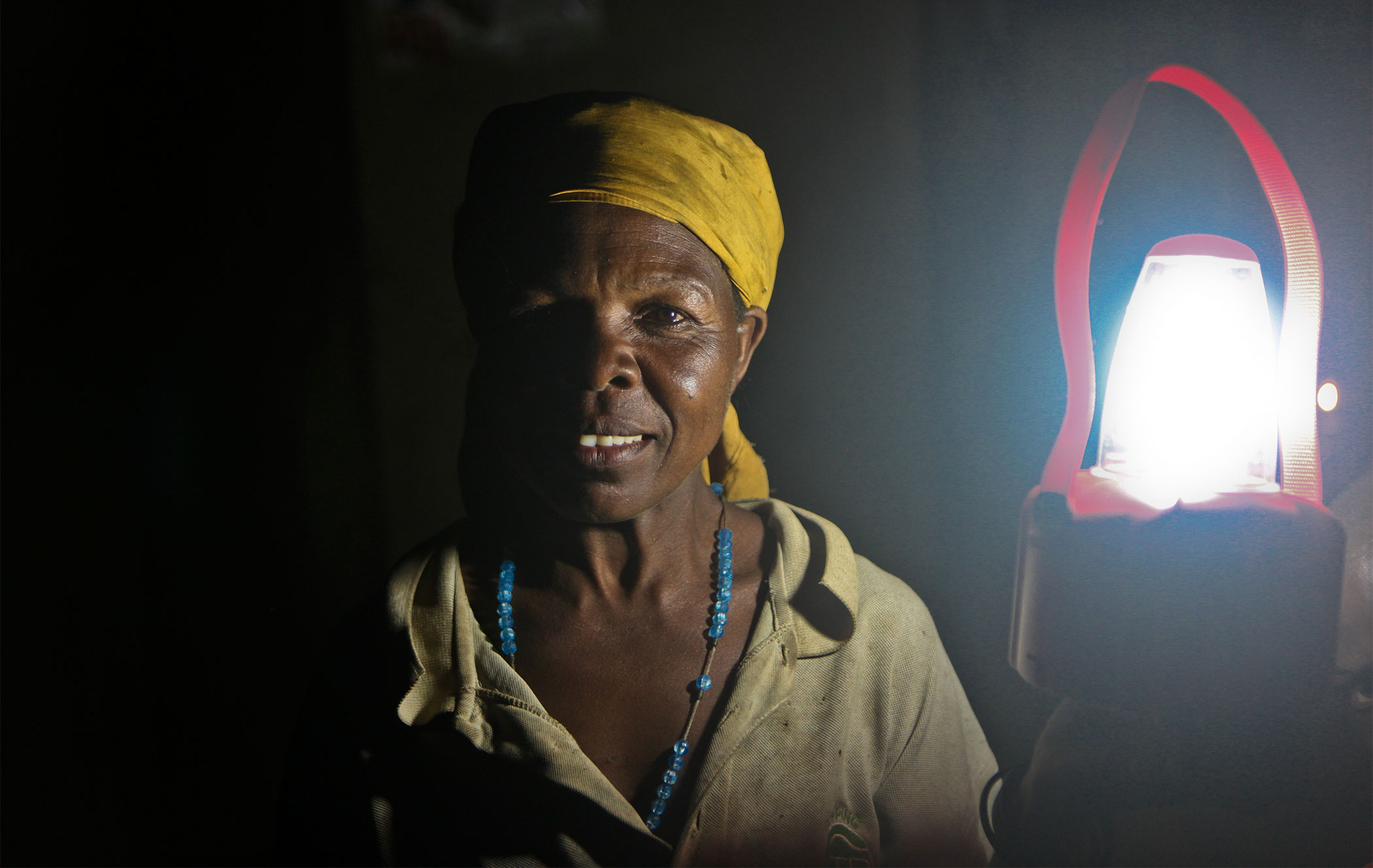 woman with yellow headscarf