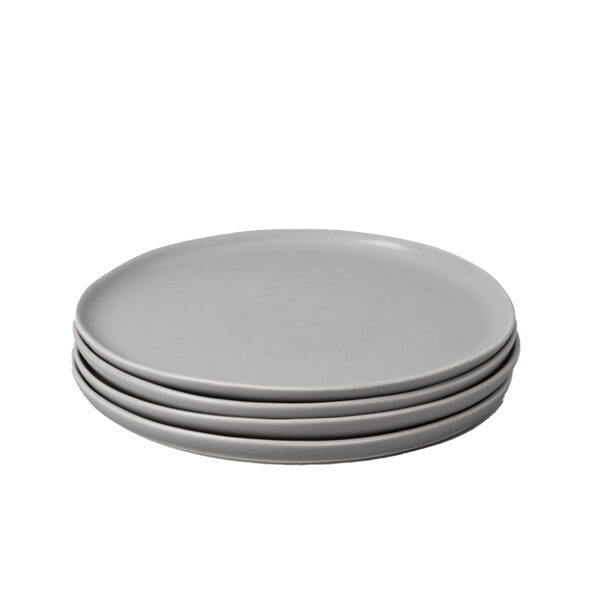 gray dinner plates in a stack of four.