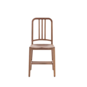 Wooden chair with open back with bars.